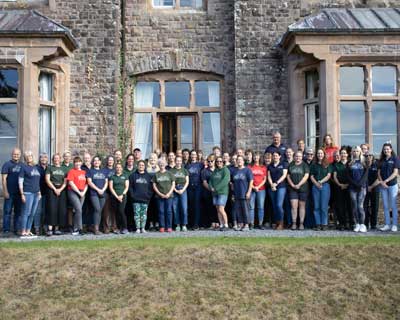 Farms for City Children full staff team in front of Nethercott House